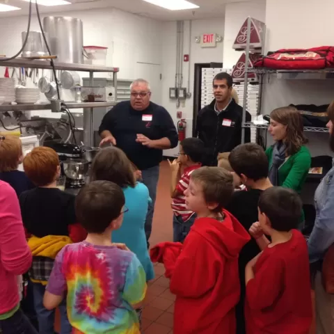 Genova's To Go Owner Giving Kids a Tour