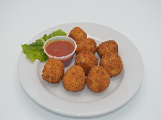 Sicilian rice balls, crispy fried chicken goodness, and a tangy sauce all in one plate!