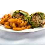 Chicken Caesar wrap with curly fries from Genova's To Go